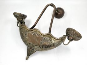 A Syrian side lamp, 19th century, made of sawn and engraved brass, handmade, arabesque decorations