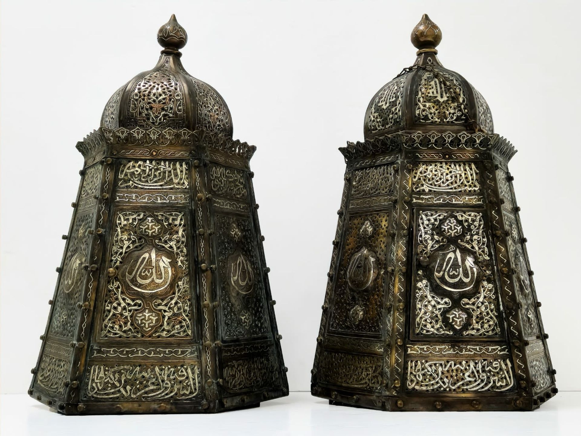 A pair of Islamic mosque lamps, impressive and high-quality lamps, made in Damascene Work, (inlay of