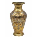 An antique Islamic vase, approximately hundred years old, made of Damascus work (copper and silver
