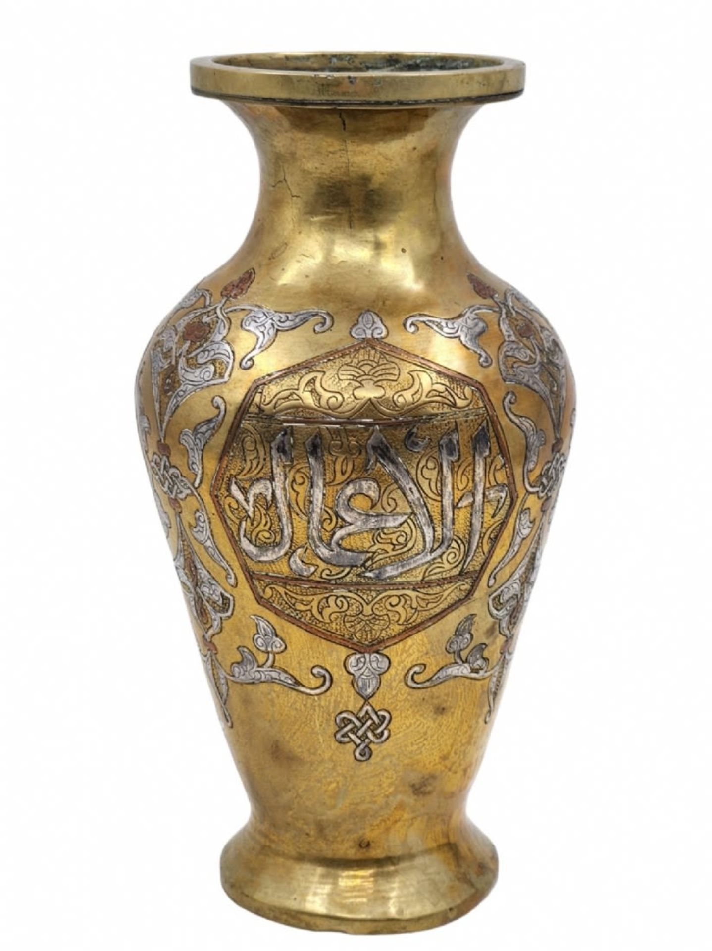 An antique Islamic vase, approximately hundred years old, made of Damascus work (copper and silver