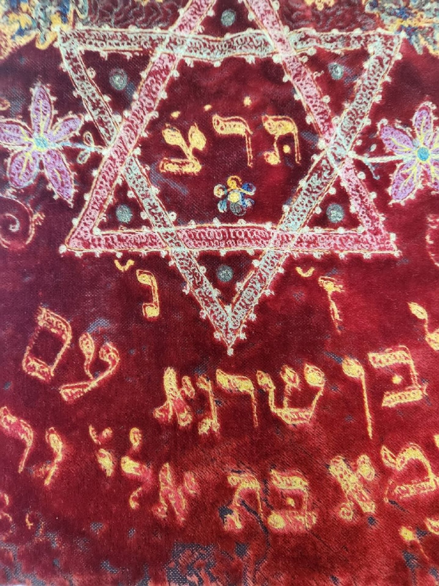 A Torah scroll coat, embroidered with cotton threads on red velvet, dating from 1929, the subject of - Image 4 of 4