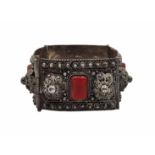 An antique silver bracelet with delicate and high-quality filigree work, combined with amber