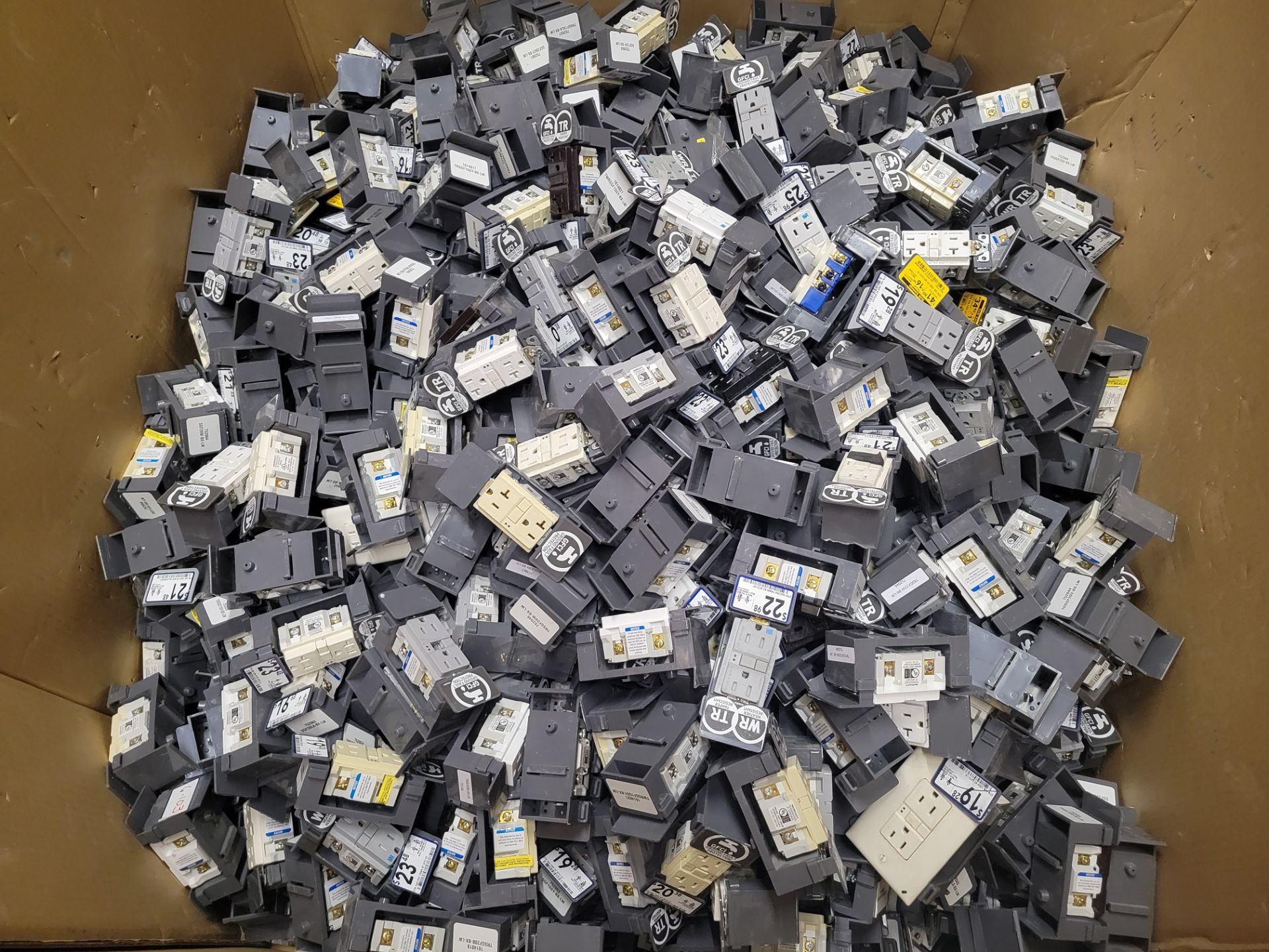 1x Lot of Assorted Eaton Outlets / Switches / Plugs - Est. 800+ Units