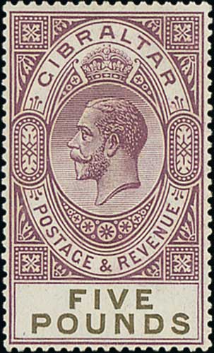 1925 £5 Violet and black fine mint. S.G. 108, £1,600. Photo included on Back Cover.