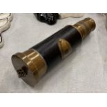 A BRASS AND LEATHER ROYAL NAVY TELESCOPE