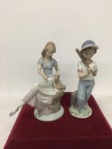 TWO LLADRO FIGURES OF A GIRL AND BOY WITH BASEBALL BAT, NO. 7612 & 7610