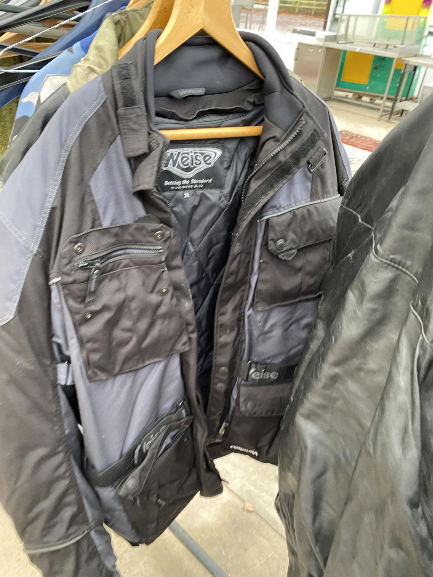 AN ASSORTMENT OF MOTORBIKE CLOTHING TO INCLUDE JACKETS AND LEATHER DUNGEREES ETC - Image 3 of 5