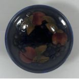 A 1930S MOORCROFT ART DECO POMEGRANATE MINIATURE FOOTED BOWL, 3" DIAMETER