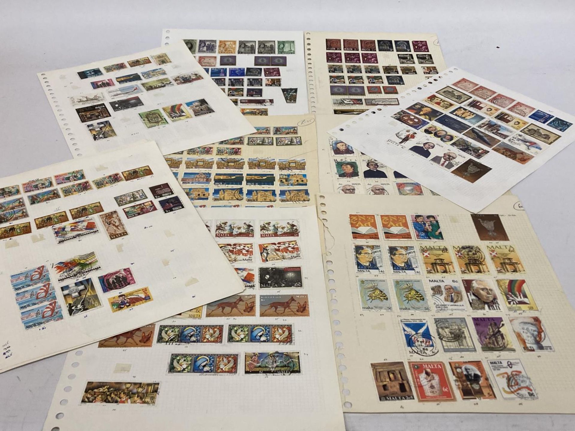 TEN PLUS SHEETS CONTAINING STAMPS FROM MALTA