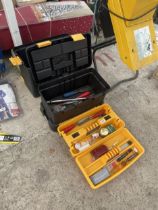 A PLASTIC STACKING TOOL BOX WITH AN ASSORTMENT OF TOOLS TO INCLUDE CHISELS ETC