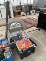 A LARGE ASSORTMENT OF BOOKS, A MIRROR AND A PROJECTOR SCREEN