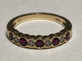 AN 18 CARAT GOLD RING WITH FOUR DIAMONDS AND FIVE RUBY IN LINE SIZE K