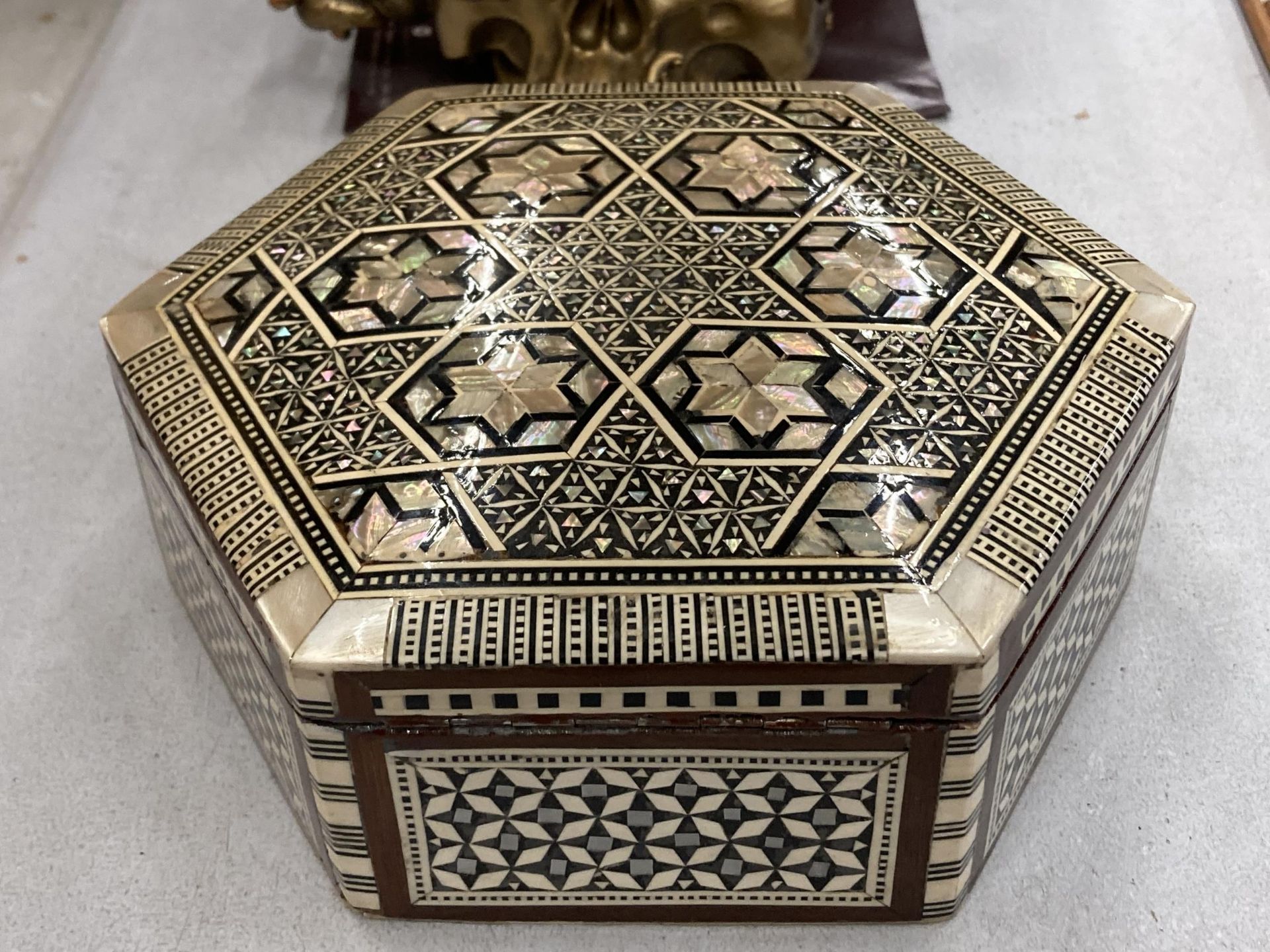 A DAMASK, MOTHER OF PEARL INLAID HEXAGONAL BOX