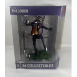 A BOXED DC CORE COLLECTIBLES THE JOKER ON HA BASE COLLECTABLE VINYL PVC 10" FIGURE