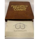 A POST OFFICE FIRST DAY COVERS ALBUM TOGETHER WITH A ROYAL WEDDING 1973 STAMP ALBUM PRINCESS ANNE