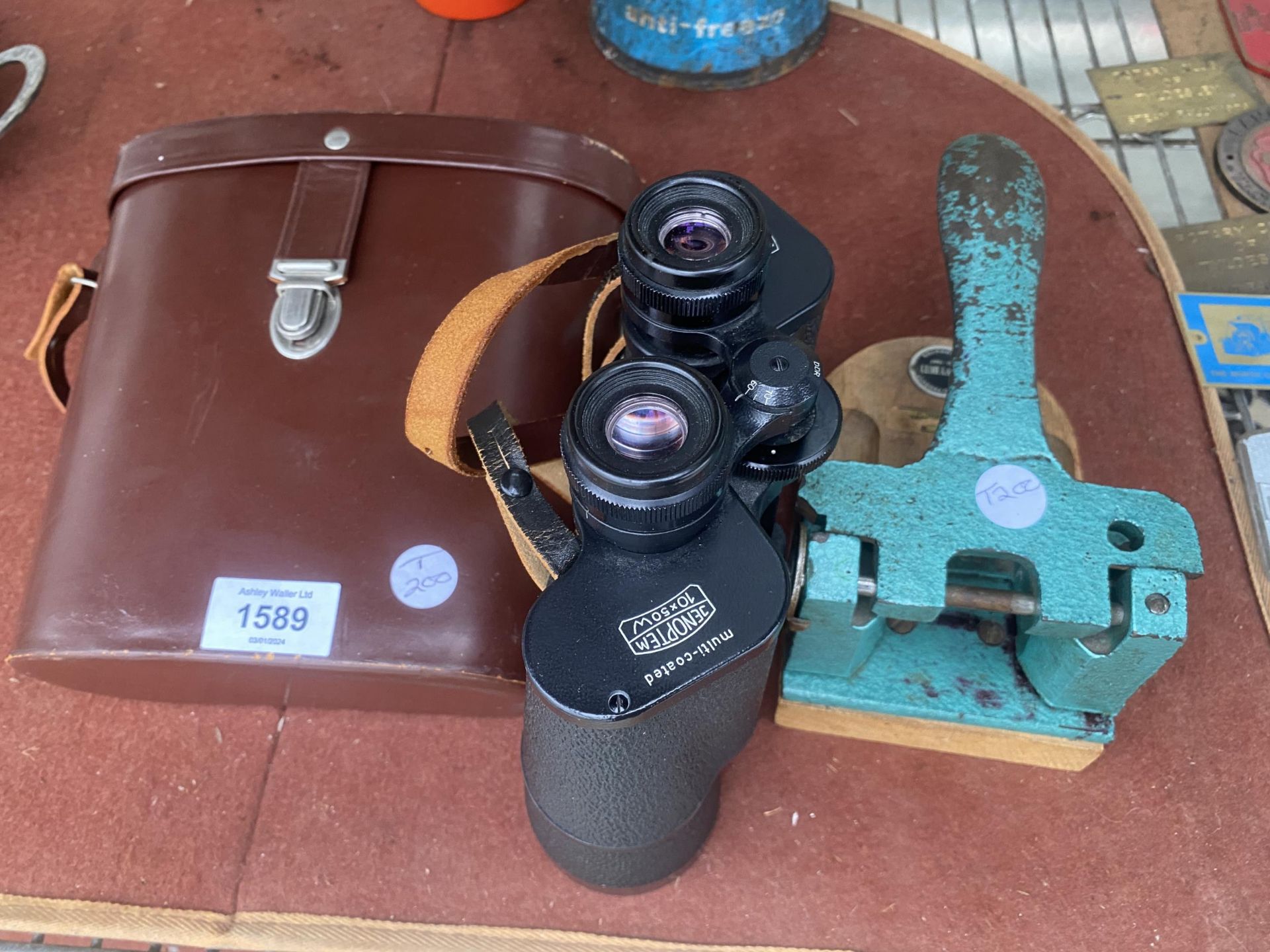 A VINTAGE PAIR OF BINOCULARS WITH CARRY CASE AND A VINTAGE STAMP