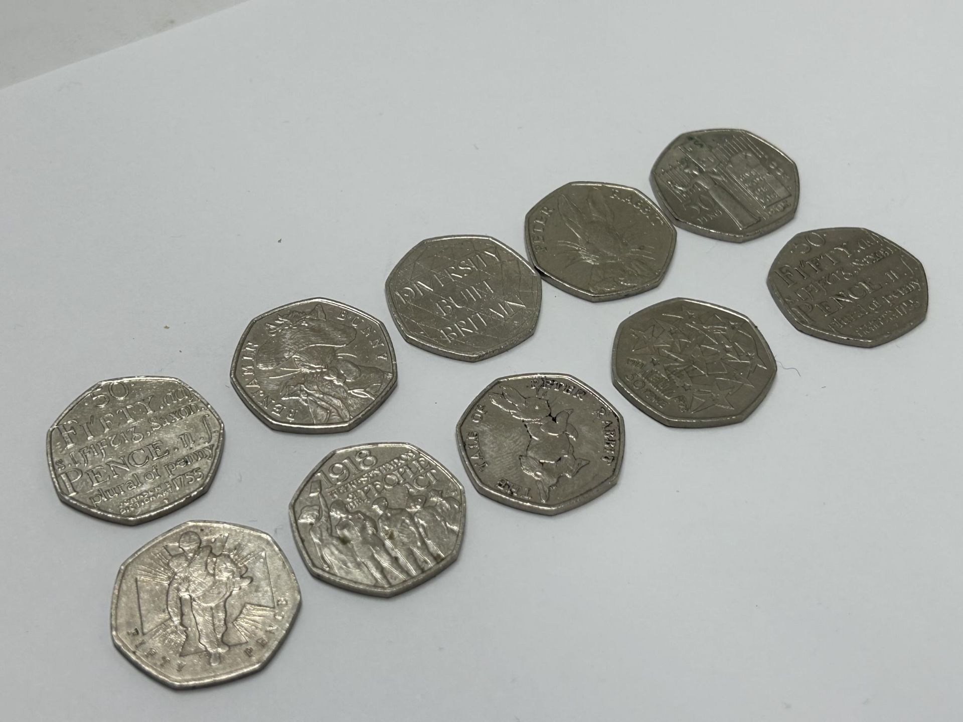 TEN VARIOUS COLLECTABLE FIFTY PENCE PIECES TO INCLUDE, PETER RABBIT, ETC - Image 2 of 3