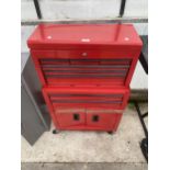 A FOUR WHEELED METAL WORKSHOP TOOL CHEST WITH MULTIPLE DRAWERS AND LOWER CUPBOARD