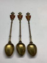 THREE MARKED 800 SILVER SPOONS