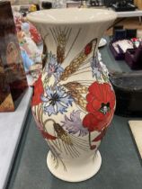 A LARGE MOORCROFT POPPY TRIAL VASE HEIGHT 12"