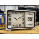 A LARGE WOODEN RETRO USA CALENDAR CLOCK 16" X 11"