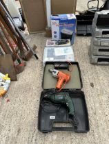 AN ASSORTMENT OF ITEMS TO INCLUDE TWO ELECTRIC DRILLS, A CAMPING STOVE AND A BLACK AND DECKER SANDER