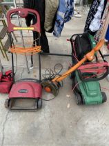 THREE GARDEN TOOLS TO INCLUDE A QUALCAST LAWNMOWER AND AN ELECTRIC STRIMMER ETC