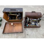 TWO VINTAGE SINGER SEWING MACHINES WITH CARRY CASES