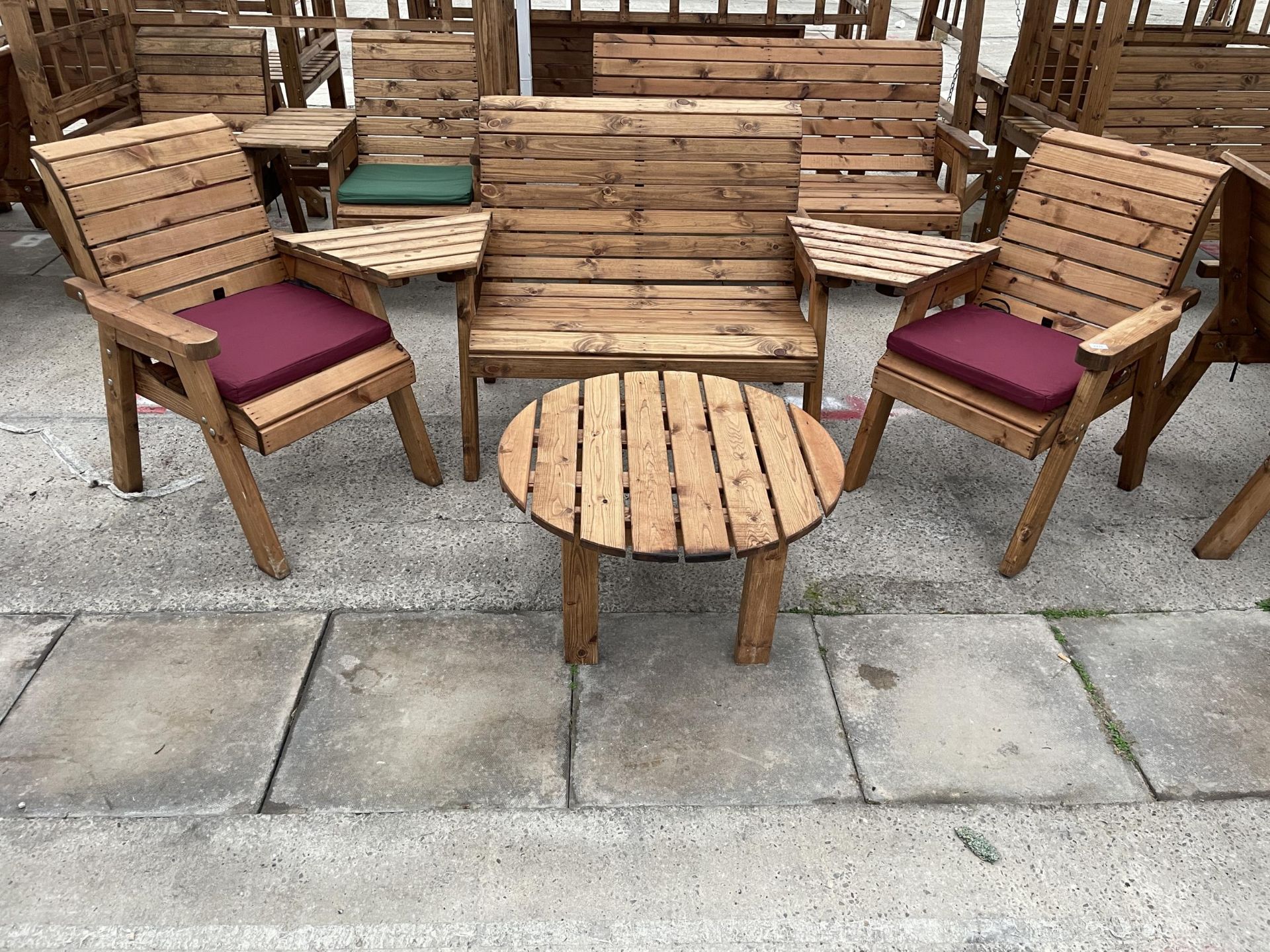 AN AS NEW EX DISPLAY CHARLES TAYLOR PATIO SET COMPRISING OF A TWO SEATER BENCH, TWO CHAIRS, TWO