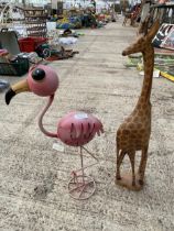 TWO TALL SAFARI ANIMAL FIGURES TO INCLUDE A TREEN GIRAFFE AND A METAL PINK FLAMINGO