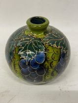 AN ANITA HARRIS HAND PAINTED AND SIGNED IN GOLD VINEYARD VASE