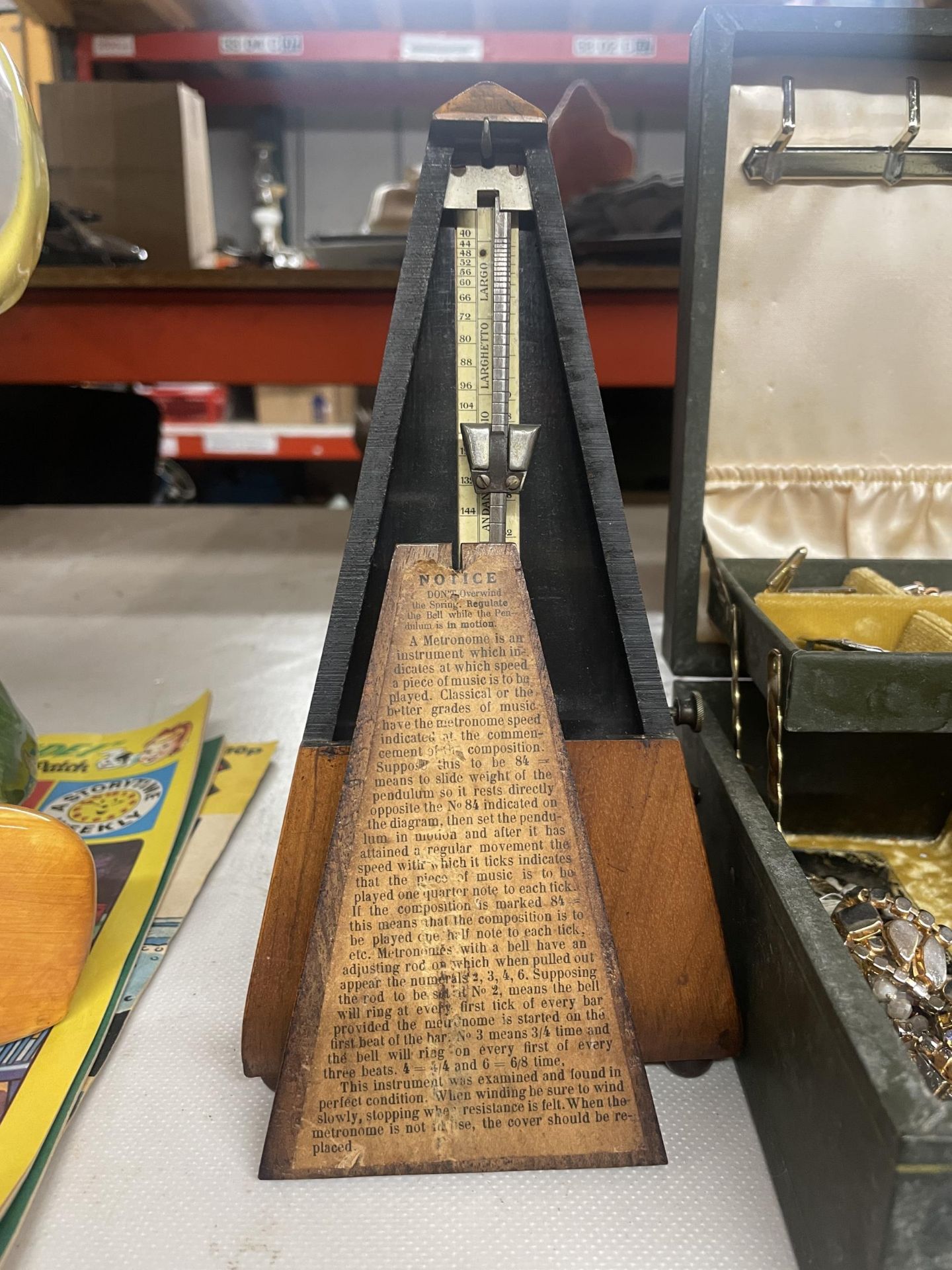 A VINTAGE SWISS WOODEN METRONOME