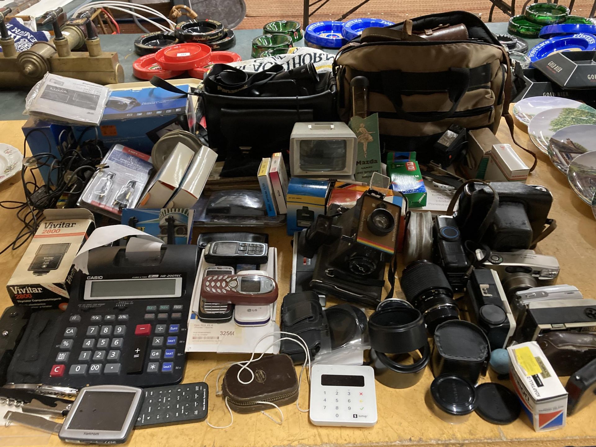 A LARGE COLLECTION OF CAMERA RELATED AND FURTHER EQUIPMENT, CAMERAS, BAGS, PHONES, CALCULATORS ETC