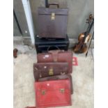 AN ASSORTMENT OF VINTAGE BRIEFCASES