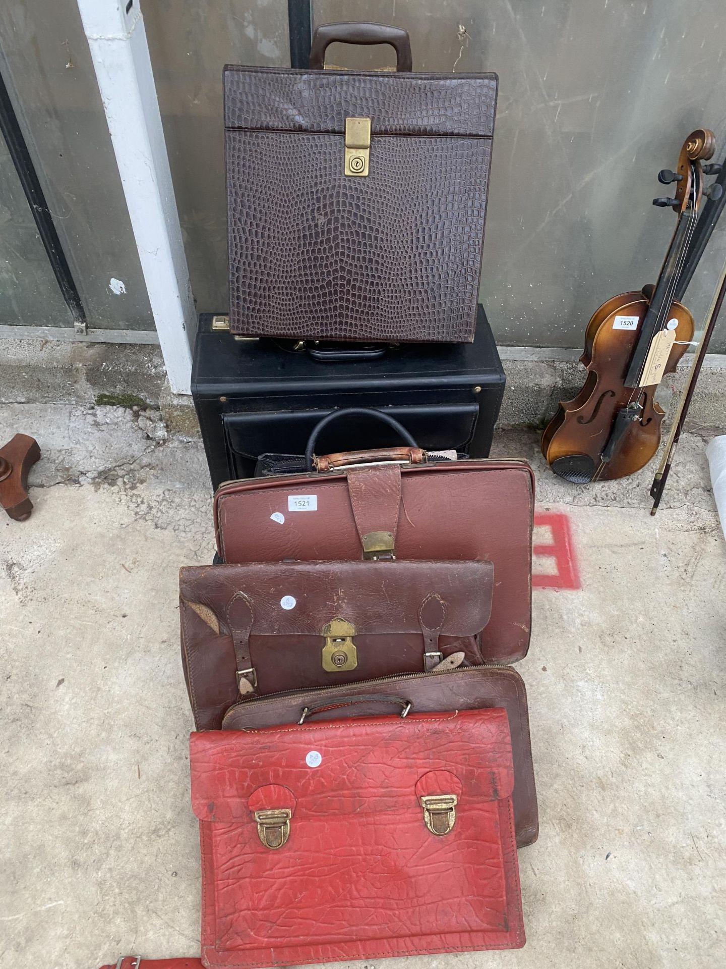 AN ASSORTMENT OF VINTAGE BRIEFCASES