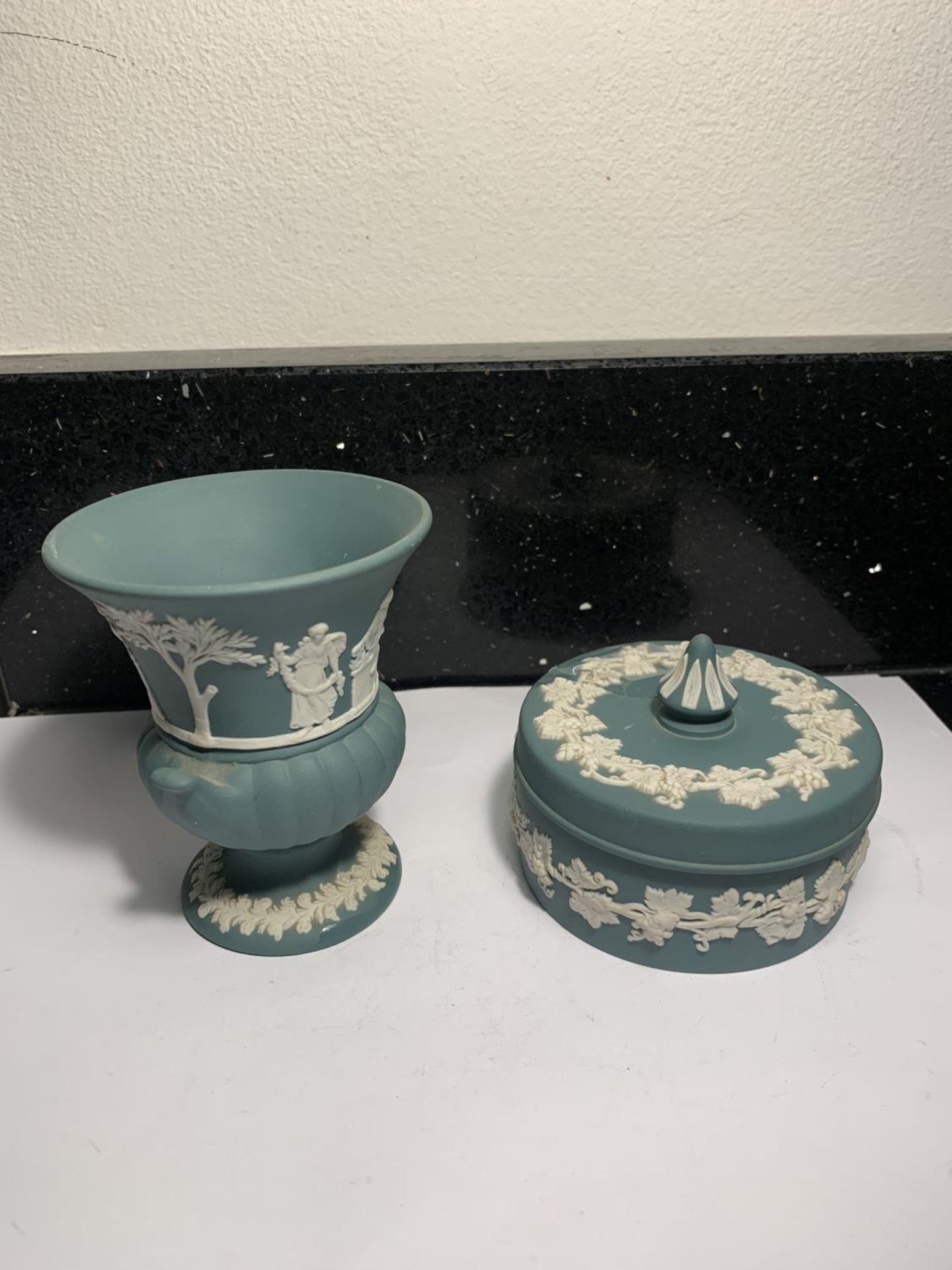 TWO ITEMS OF RARE GREEN WEDGWOOD JASPERWARE TO INCLUDE A VASE AND A LIDDED POT