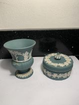 TWO ITEMS OF RARE GREEN WEDGWOOD JASPERWARE TO INCLUDE A VASE AND A LIDDED POT