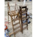 TWO VINTAGE FOUR RUNG WOODEN STEP LADDERS