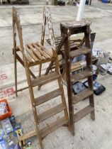 TWO VINTAGE FOUR RUNG WOODEN STEP LADDERS