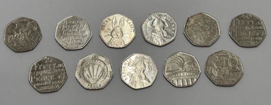 ELEVEN VARIOUS COLLECTABLE FIFTY PENCE PIECES TO INCLUDE, PETER RABBIT, ETC