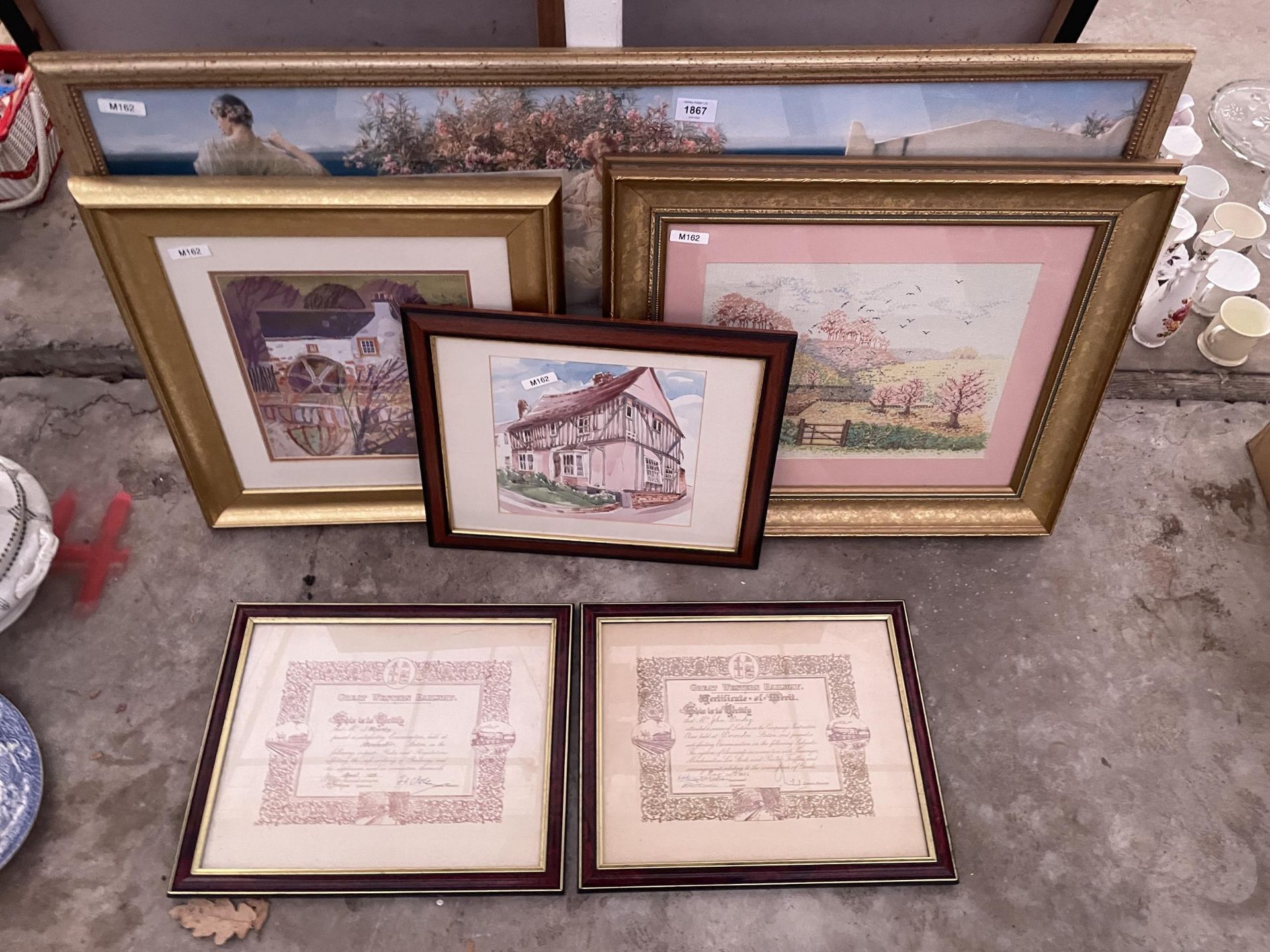 AN ASSORTMENT OF FRAMED PRINTS