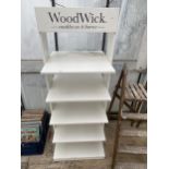 A WOODEN 'WOODWICK' SHOP DISPLAY STAND