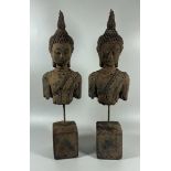 A PAIR OF DECORATIVE STONE BUDDHA HEAD AND TORSOS ON PLINTHS, HEIGHT 39 CM