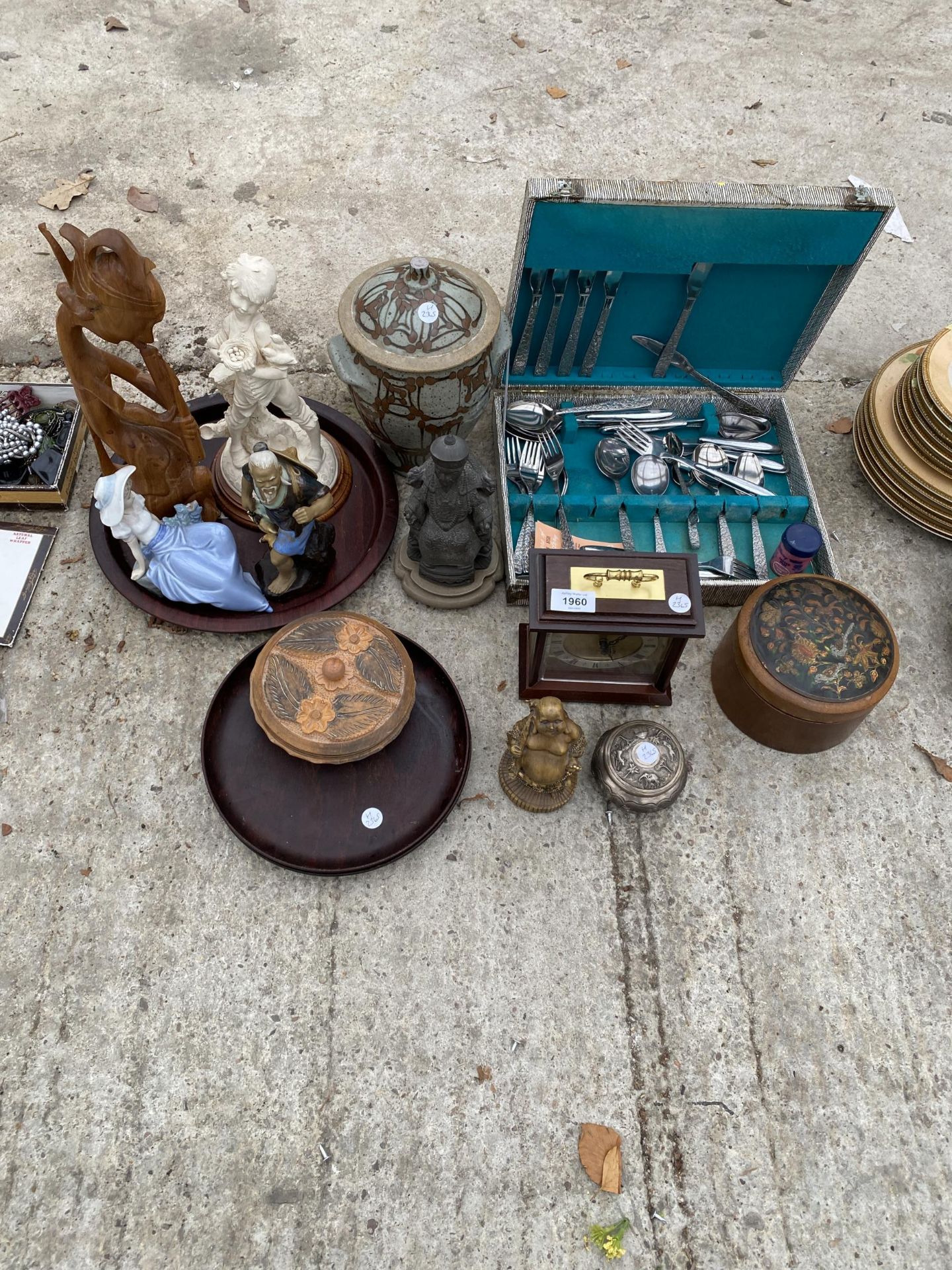 AN ASSORTMENT OF ITEMS TO INCLUDE ORIENTAL FIGURES , A CLOCK AND FLATWARE ETC