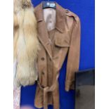 A BROWN LEATHER LONG LADIES COAT