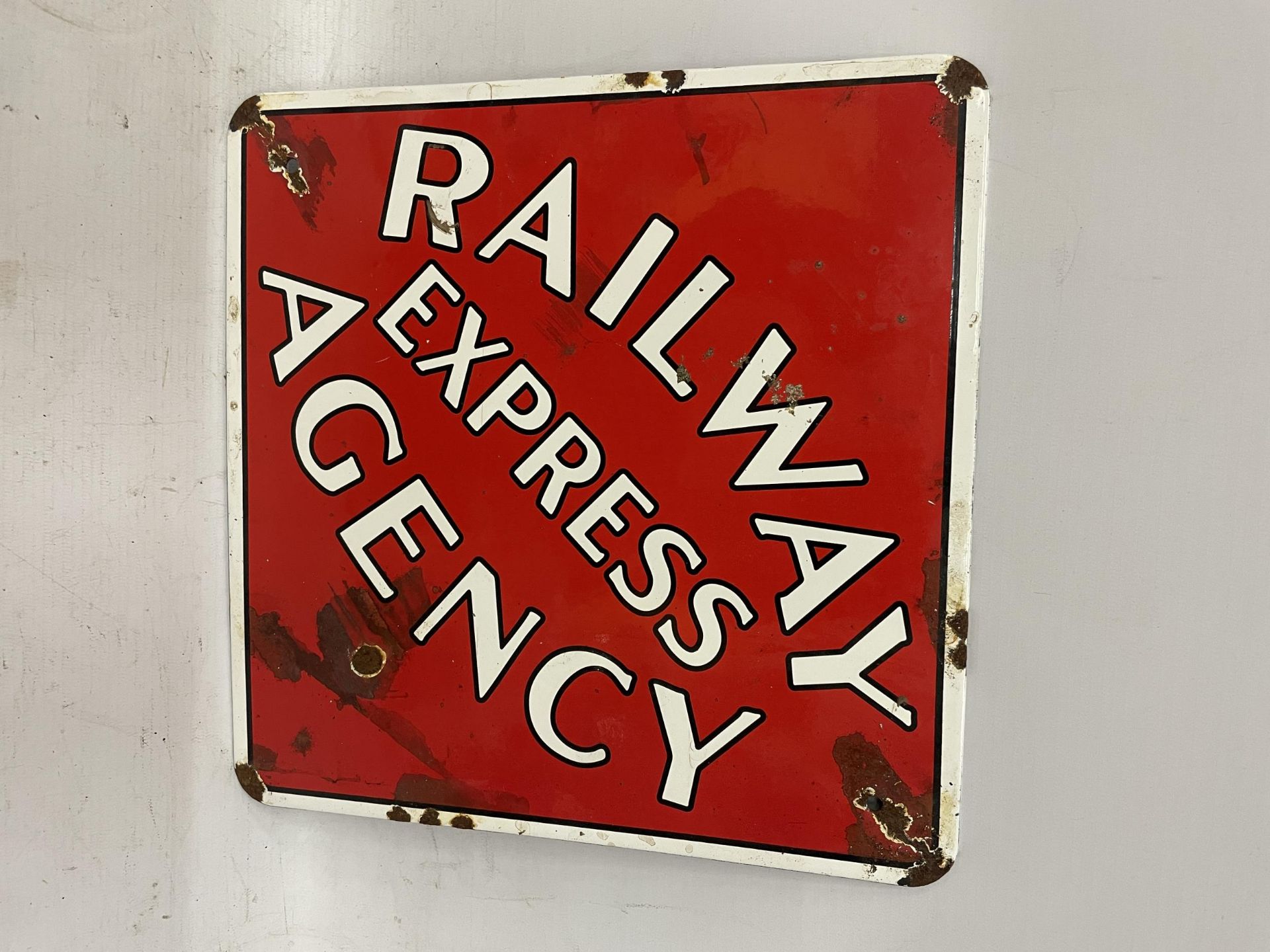 AN ENAMEL RAILWAY EXPRESS AGENCY SIGN