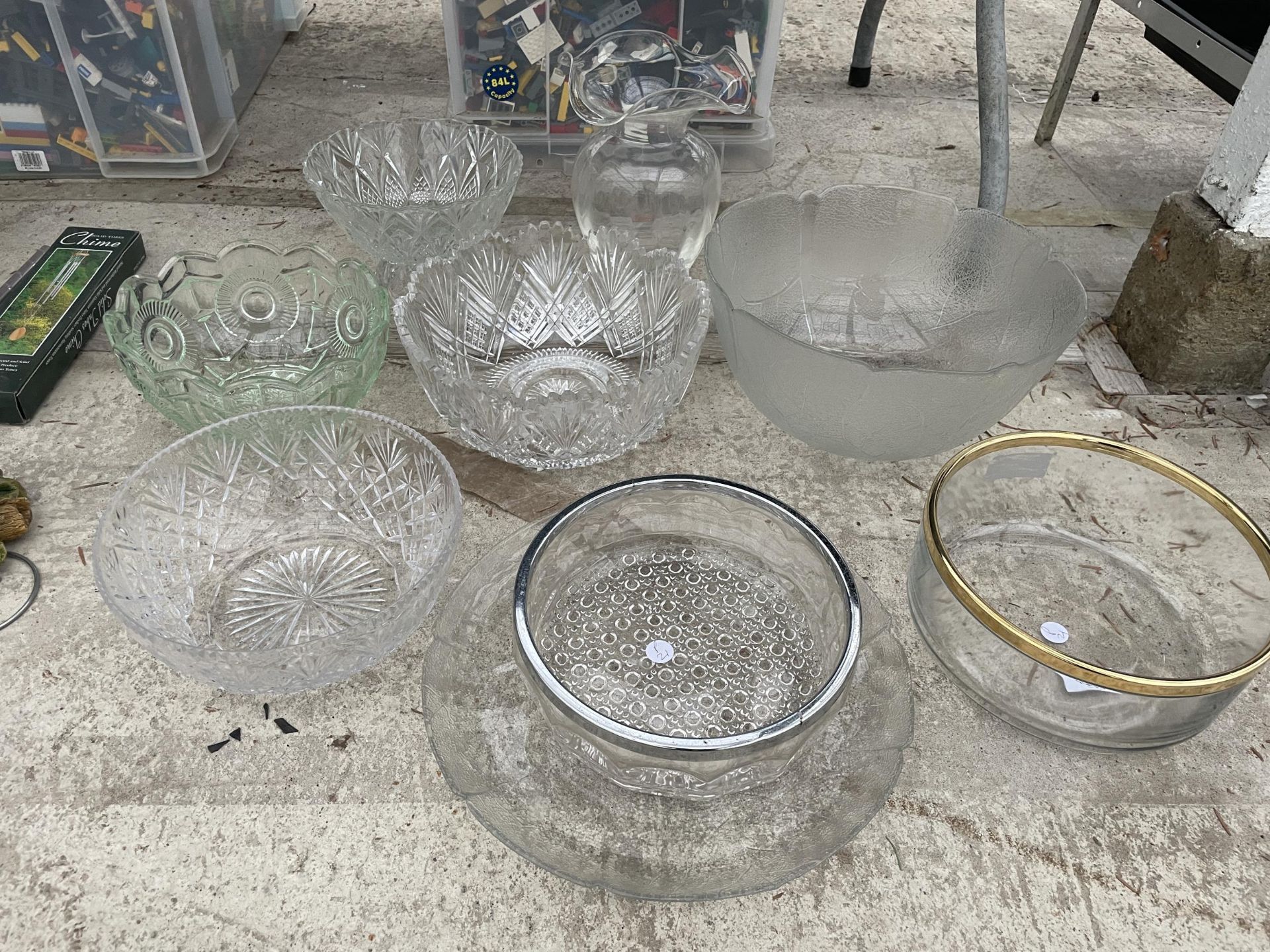 AN ASSORTMENT OF GLASS BOWLS AND VASES ETC
