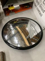 A CIRCULAR CONVEX MIRROR