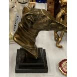 A BRONZE BUST OF A GREYHOUND HEAD ON A MARBLE BASE