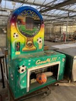 A LARGE INDUSTRIAL KICKER SCORE FOOTBALL MACHINE